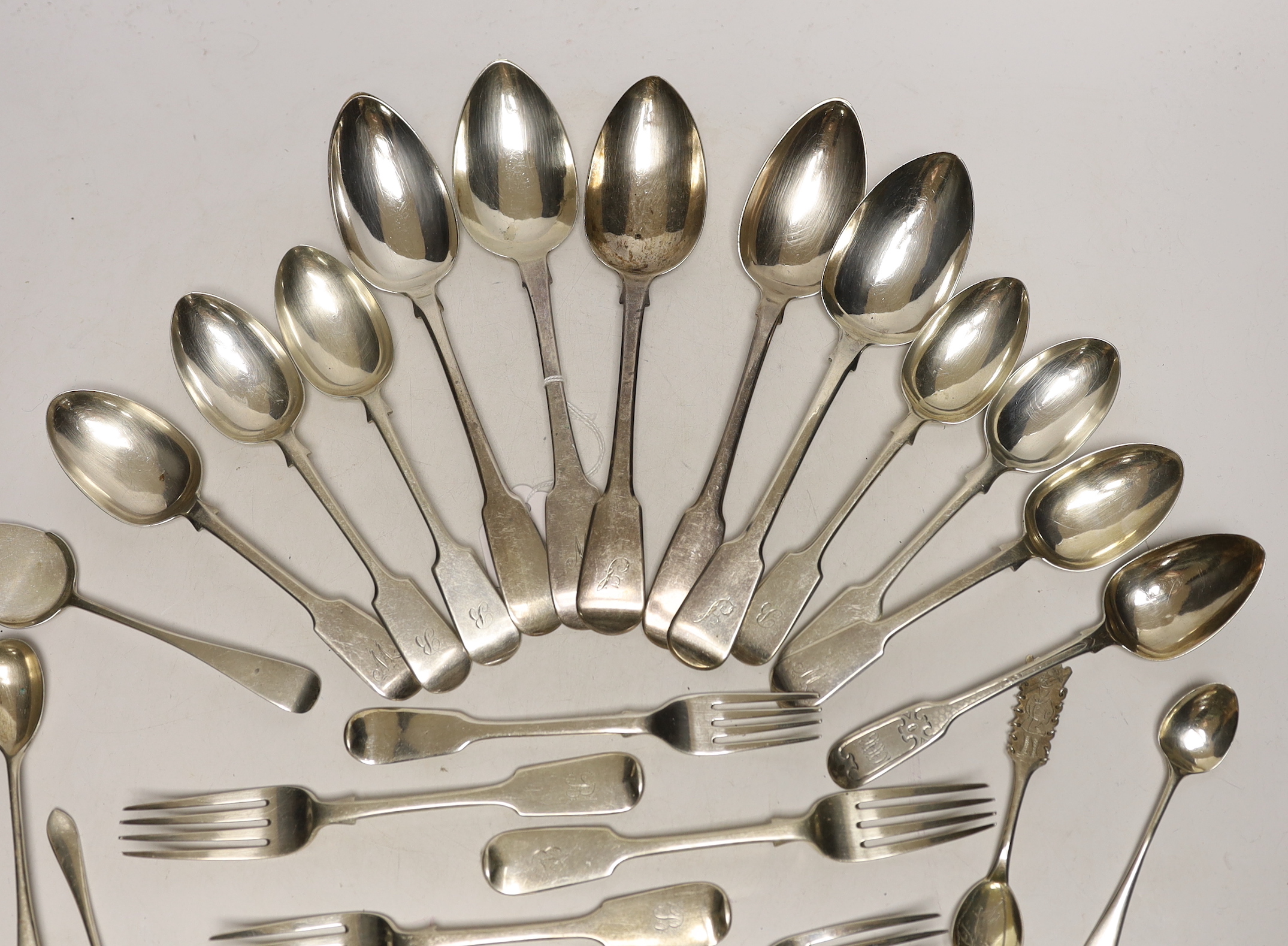 A quantity of assorted mainly 19th century silver flatware, various patterns, dates and makers and a Swedish teaspoon